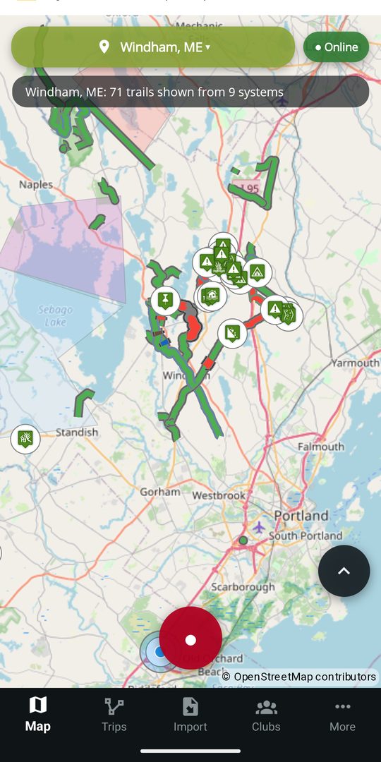 The DynamicTrail map showing club trails around Windham, Maine, with closed sections in red and hazard pins